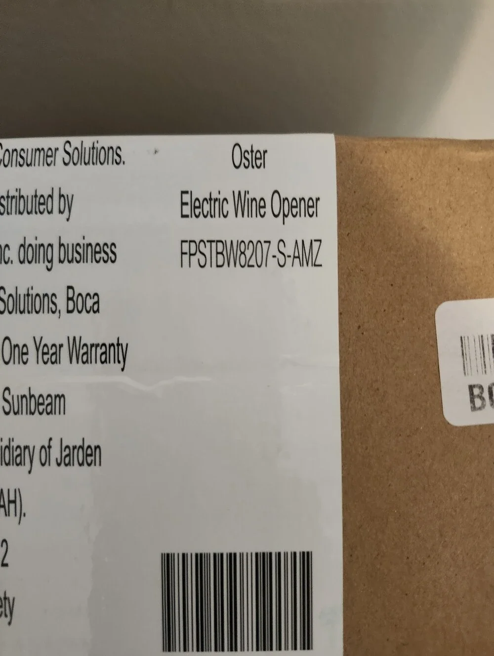 New In Box. Oster Silver and Black Electric Wine Opener with Charging Base.